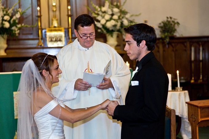 Wedding with couple and priest