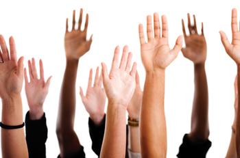hands raised to ask a question