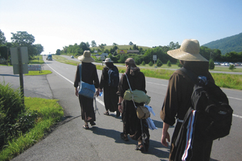 Friars walking down the road