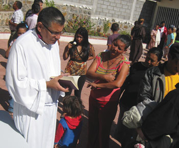 Zúñiga with visitors from the neighborhood at an open house