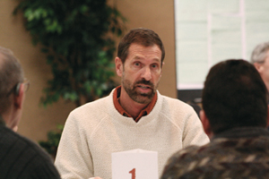 Father Guy Blair, S.C.J. talks with some of his fellow Priests of the Sacred Heart during a community meeting.