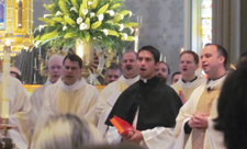 Matthew Kuczora, C.S.C. (center) at a friend’s first Mass