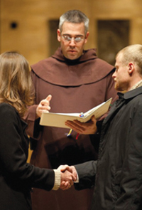 Father michael prepares Keith and Kate Bersch for their 2011 wedding at the Chapel of St. Thomas at the University of St. Thomas in Minnesota.