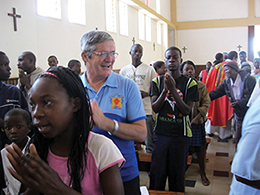 Brother Lucas takes part in a Sunday Mass. Worship is a full-body experience in Amatongas, with singing, dancing, and a great deal of energy.