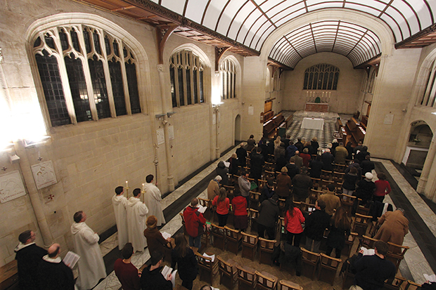 The community begins conventual Mass in the evening