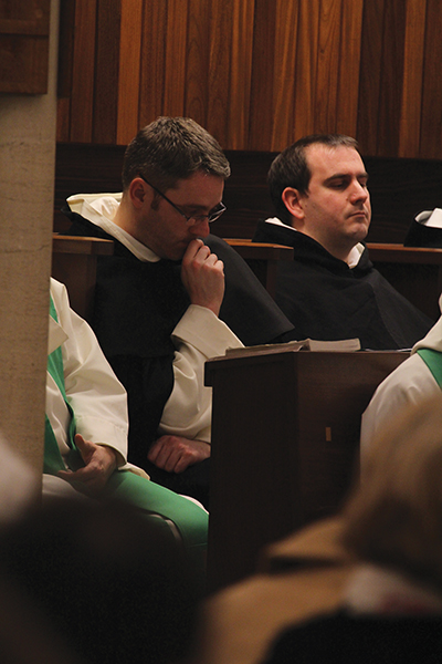 Gay (at left) and his confreres in the choir area.