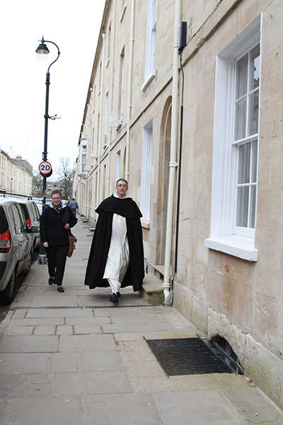 Gay walks to his office at Blackfriars Hall.