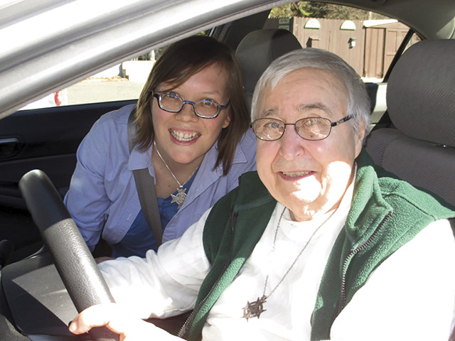  Sister Julia Walsh, F.S.P.A. shares a car with Sister Anita Beskar, F.S.P.A.