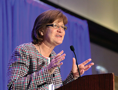 Sister Terry Rickard, O.P. gives a talk at a convocation of the National Religious Vocation Conference. 