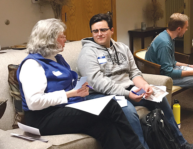 A college student talks to Sister Laura Leming, F.M.I. 