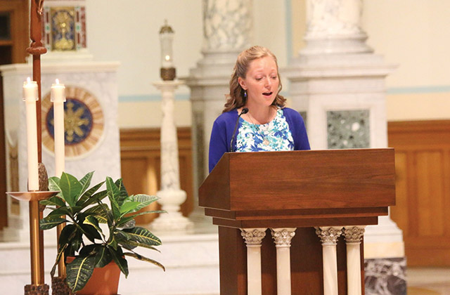 Sister Tracy Kemme, S.C. sings at the motherhouse of her community, the Sisters of Charity of Cincinnati, during her final vows liturgy. 