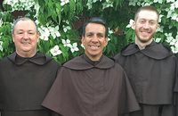Father Paul Henson, O.Carm. (center right) with some of the men who entered his community in recent years.