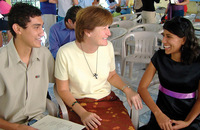 Sister Terry Rickard, O.P. meets with young people during a RENEW International visit to El Salvador.