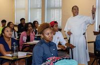 Brother Herman Johnson, O.P., leading the discussion with his college students, often fields questions about what it means to be a brother.